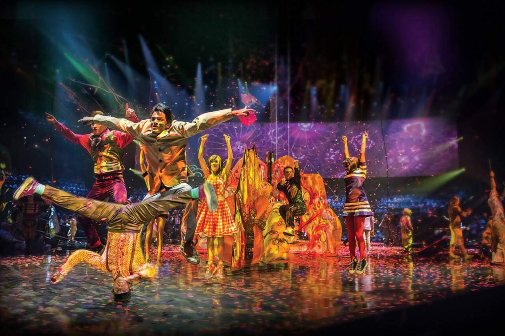 performers from cirque du soleil the beatles LOVE show onstage in las vegas