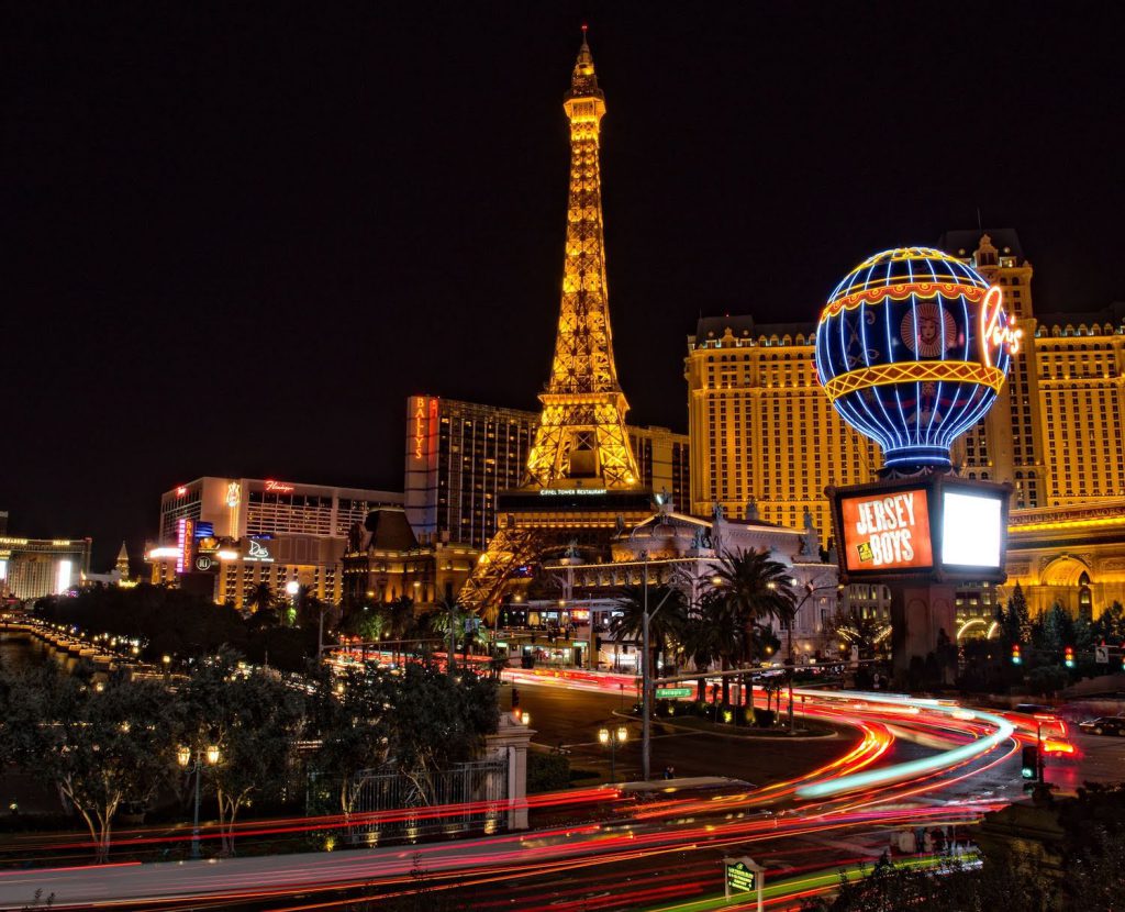 the eiffel tower at paris las vegas hotel & casino lit up at night