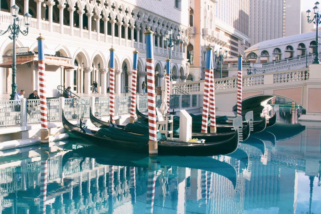 gondolas lined up at the venetian canal in las vegas