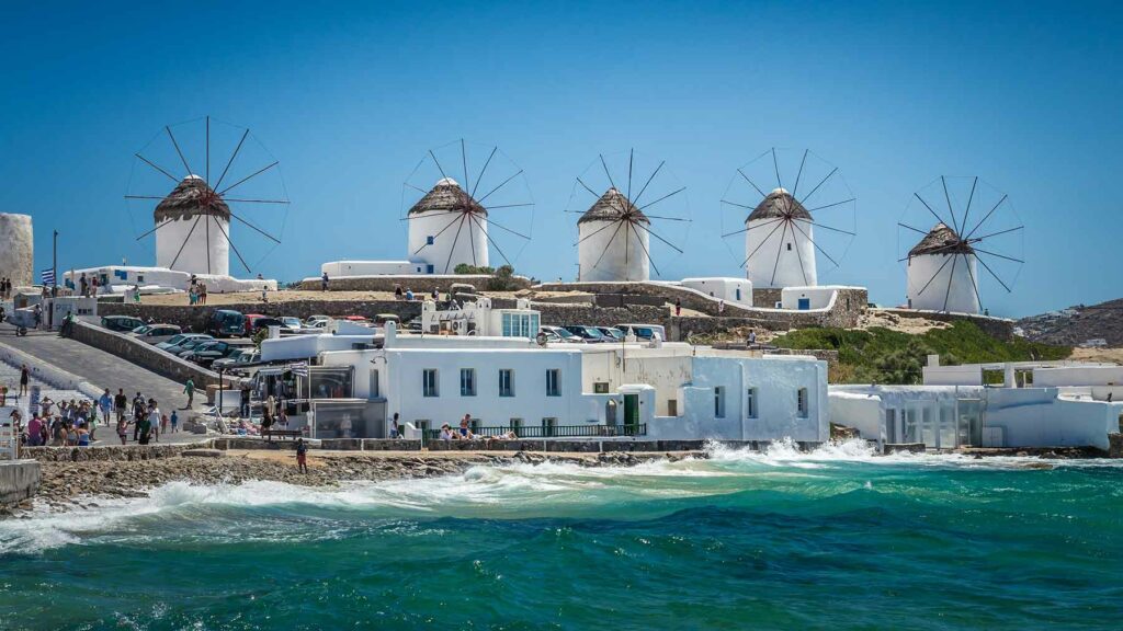 Famous windmills during a clear and bright summer day in Mykonos, Cyclades Islands, Greece.
