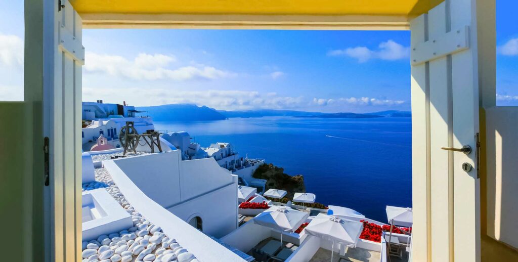 Beautiful sea view from a balcony in Oia town, Santorini island, Greece