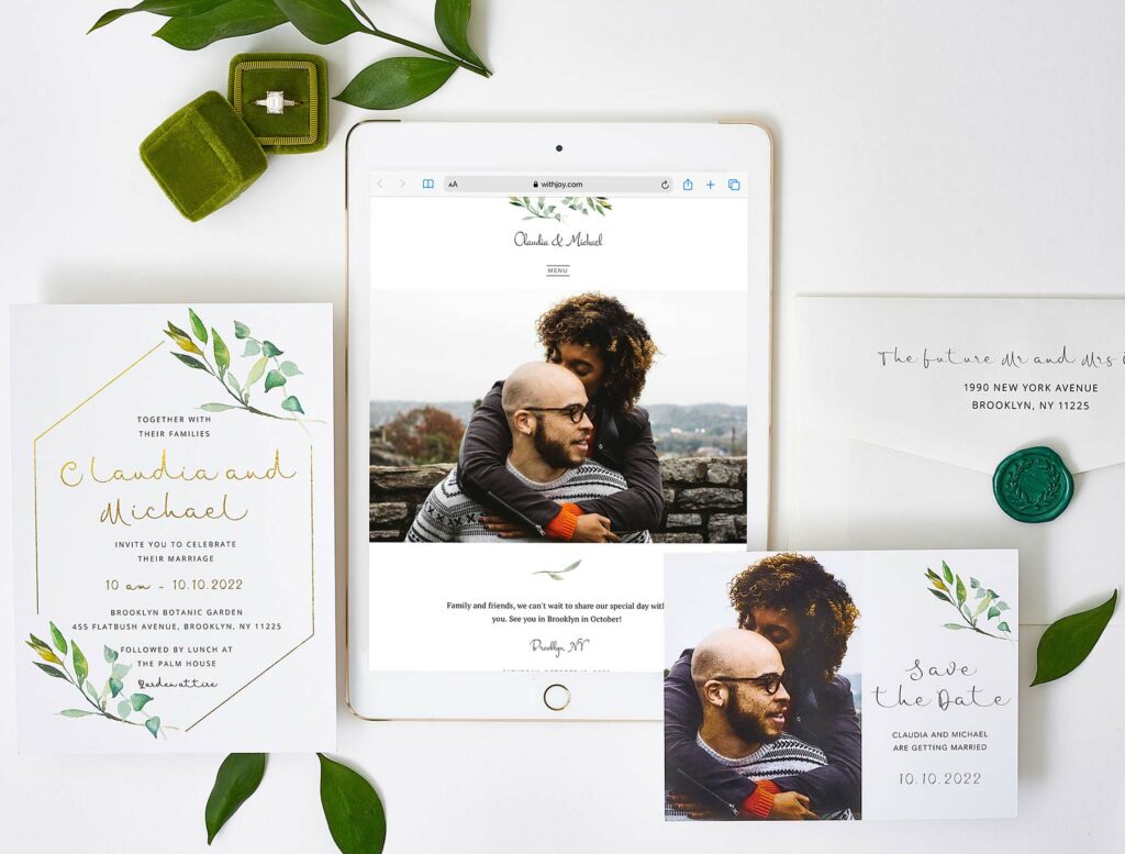 Wedding invitation guide photo featuring Joy's garden window theme with a save the date, wedding website and envelope