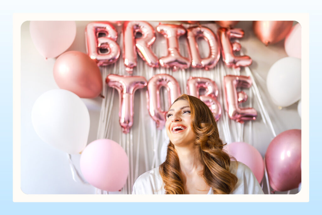 bride to be with balloons enjoying bridal shower surprise