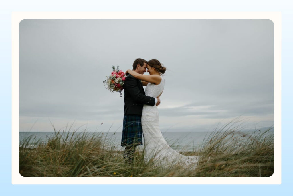 married couple posing for photos during their destination wedding ceremony
