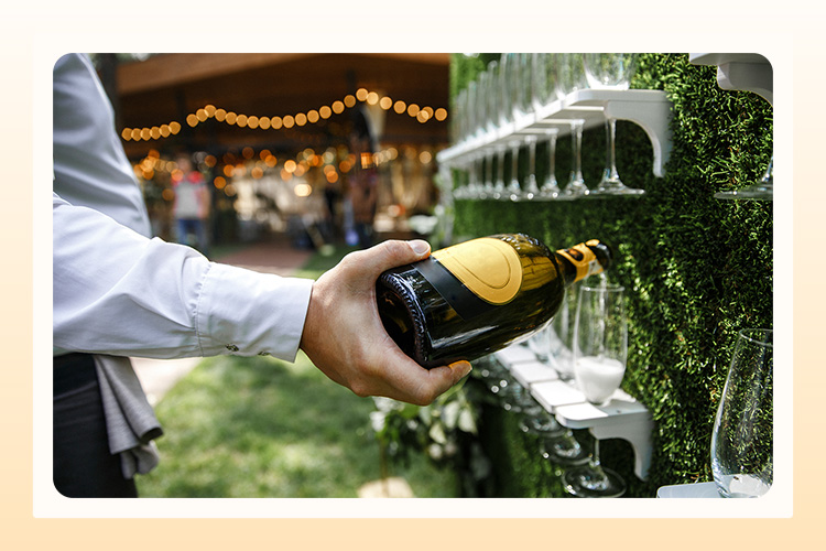 champagne wall at a wedding